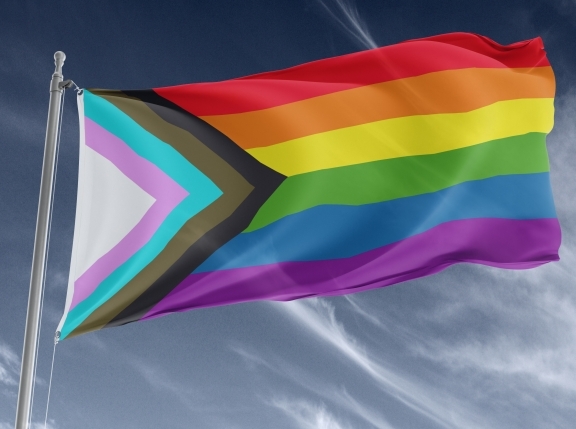 Progress Pride Flag swaying in the wind